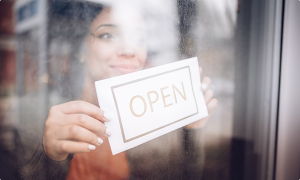 Lady opening a shop